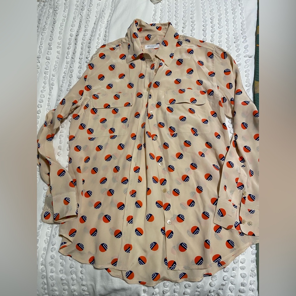 Blush colored long sleeve silk blouse by Equipment.